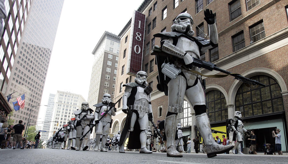 Participants dressed up as stormtrooper characters from the Star Wars movies make their way down Peachtree Street during the sixth annual Dragon Con parade Saturday, Sept. 1, 2007.