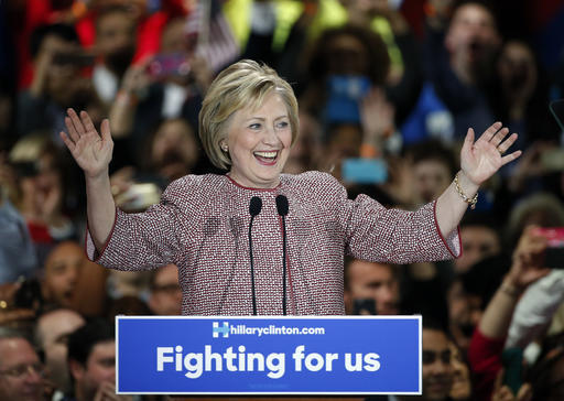 Democratic presidential candidate Hillary Clinton celebrates on stage after winning the New York state primary Tuesday, April 19, 2016, in New York.