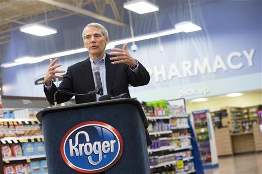 In this Friday, Feb. 12, 2016, photo, Sen. Rob Portman, R-Ohio, speaks during a news conference at the Oakley Kroger Marketplace store, in Cincinnati, to announce the supermarket chain's decision to offer the opioid overdose reversal medicine naloxone.