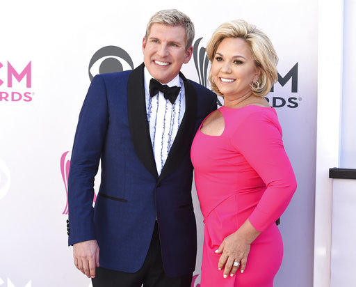 Todd Chrisley, left, and Julie Chrisley arrive at the 52nd annual Academy of Country Music Awards at the T-Mobile Arena on Sunday, April 2, 2017, in Las Vegas.