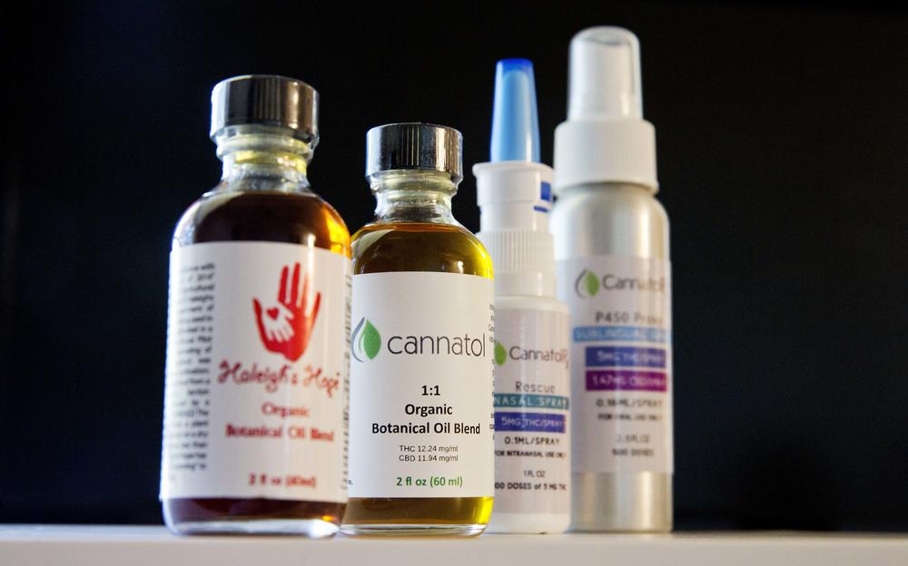 In this  photo, various cannabis oil products are displayed in the office of Georgia State Rep. Allen Peake, R - Macon, in Macon, Ga. Peake is at the center of a semi-legal statewide medical cannabis distribution network.