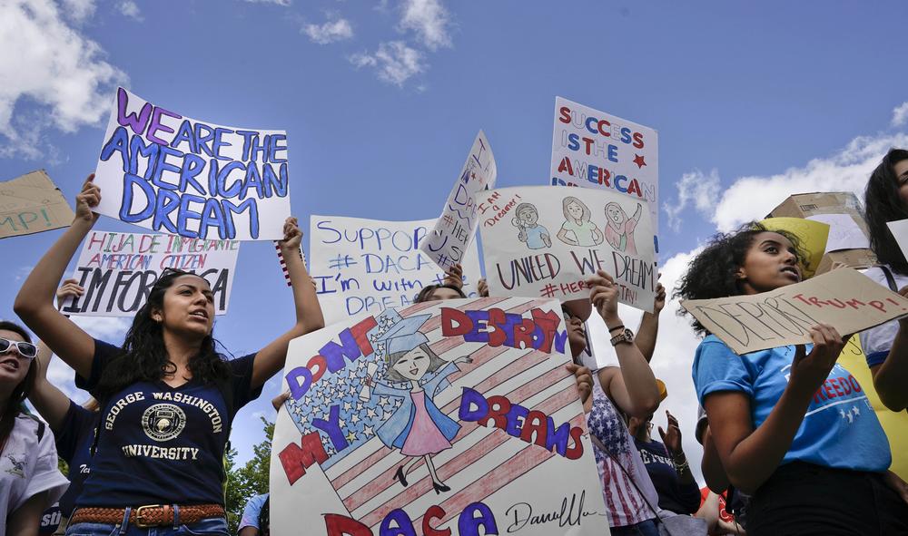 Supporters of Deferred Action for Childhood Arrival program (DACA) demonstrate on Pennsylvania Avenue in front of the White House in Washington, Saturday, Sept. 9, 2017. 