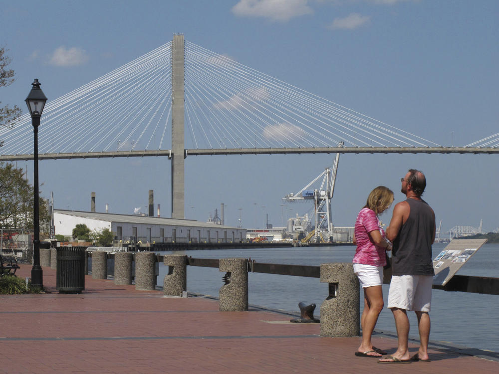 The Eugene Talmadge Memorial Bridge stretches across the skyline over Savannah's downtown riverfront on Thursday, Sept. 28, 2017.