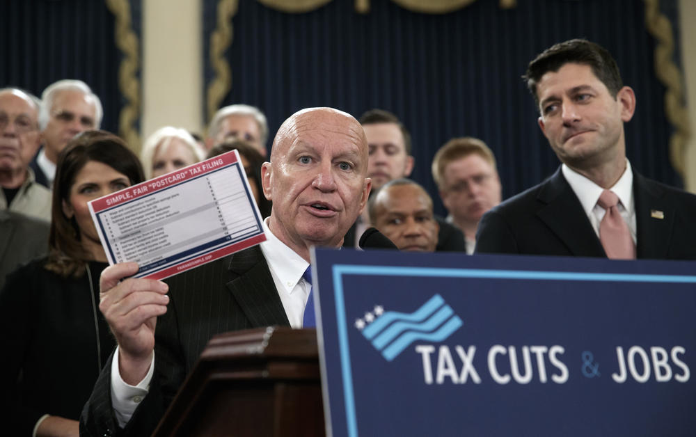 House Ways and Means Committee Chairman Kevin Brady, R-Texas, joined by Speaker of the House Paul Ryan, R-Wis., right, as they unveil the GOP's far-reaching tax overhaul, on Capitol Hill in Washington, Thursday, Nov. 2, 2017.