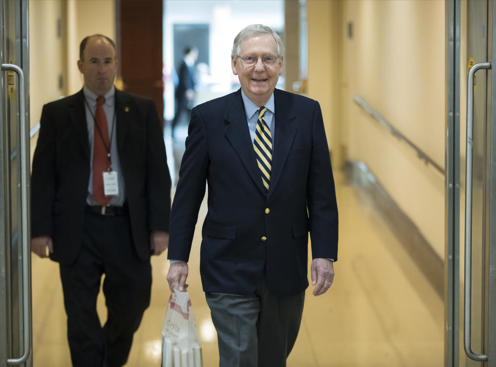 Senate Majority Leader Mitch McConnell, R-Ky., walks through the Capitol as lawmakers return to work after their Thanksgiving break to face unfinished business on taxes and spending, in Washington, Monday, Nov. 27, 2017. 