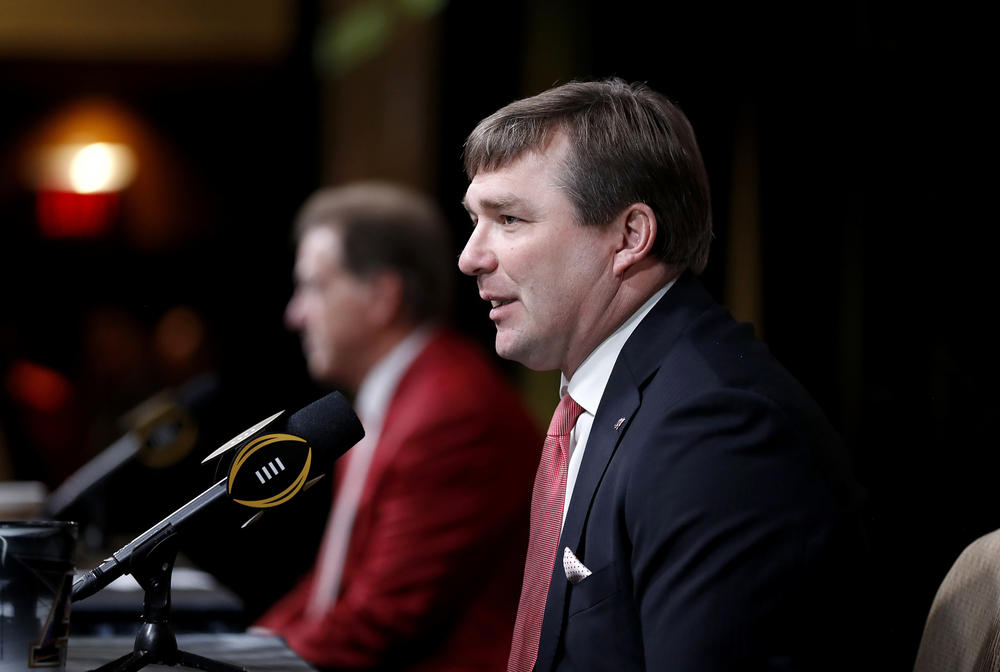 Georgia head coach Kirby Smart, right, speaks during a press conference next to Alabama head coach Nick Saban ahead of the NCAA college football national championship in Atlanta.