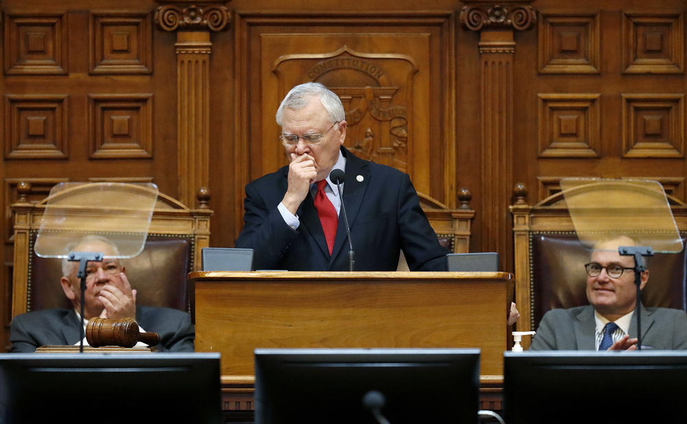 Georgia Gov. Nathan Deal fights back tears while delivering the State of the State address on the House floor as Lt. Gov. Casey Cagle, right, and House Speaker David Ralston look on at the state Capitol in Atlanta, Thursday, Jan. 11, 2018.
