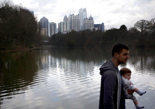 The midtown skyline stands in the background in Piedmont Park in Atlanta.