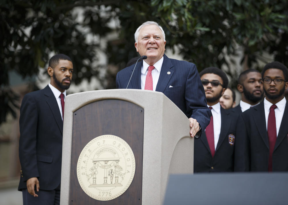 Georgia Gov. Nathan Deal addresses the crowd at the Capital during the March for Humanity marking the 50th anniversary of Rev. Martin Luther King Jr.'s assassination, Monday, Apr. 9, 2018, in Atlanta.