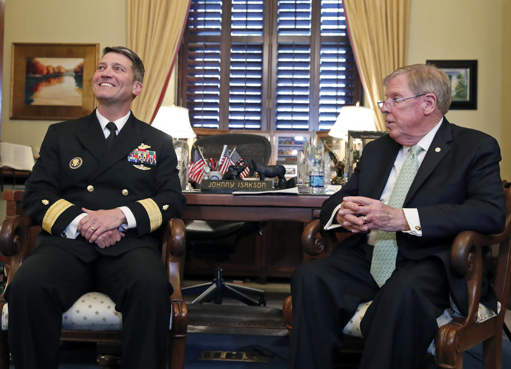 U.S. Navy Rear Adm. Ronny Jackson, M.D., left, sits with Sen. Johnny Isakson, R-Ga., chairman of the Veteran's Affairs Committee, before their meeting on Capitol Hill, Monday, April 16, 2018 in Washington. 