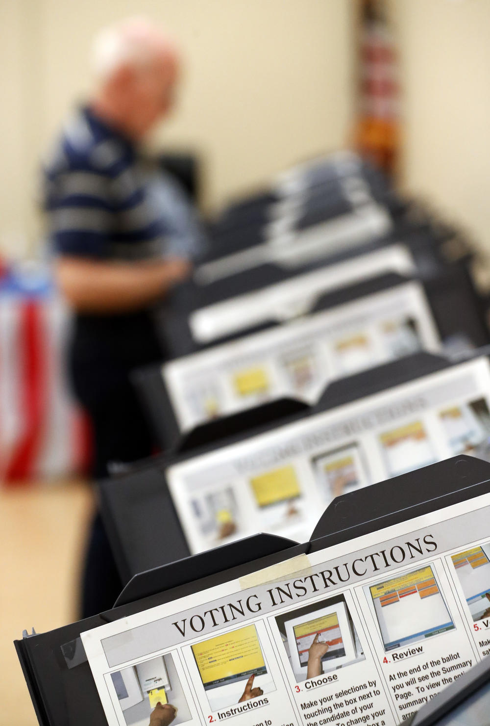 Voter casting his ballot in Sandy Springs, Ga.