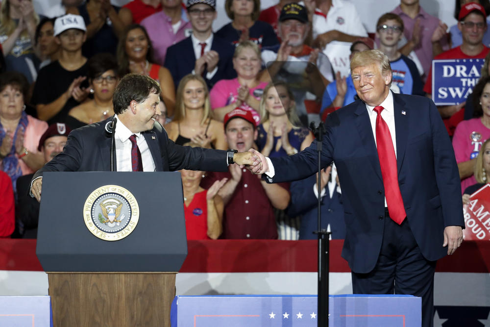 President Trump shakes hands with Ohio 12th District Republican nominee Troy Balderson during a rally last weekend in Lewis Center, Ohio.