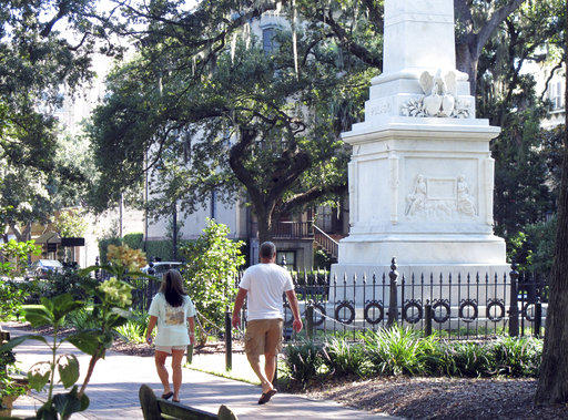 In this Aug. 31, 2018 photo, people stroll through Monterey Square in the historic landmark district of Savannah. Air along the coast earned recent air quality grades of A from the American Lung Association.