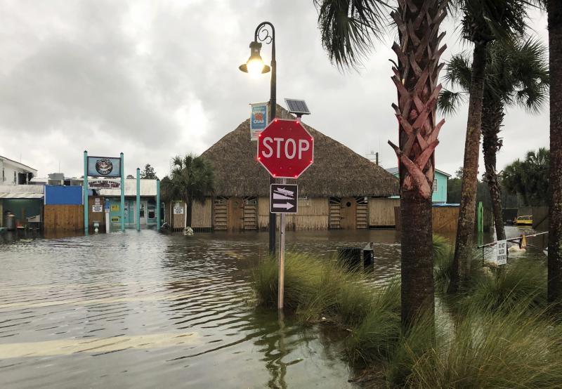 The St. Marks River overflows into the city of St. Marks, Fla., ahead of Hurricane Michael, Wednesday, Oct. 10, 2018. The hurricane center says Michael will be the first Category 4 hurricane to make landfall on the Florida Panhandle.