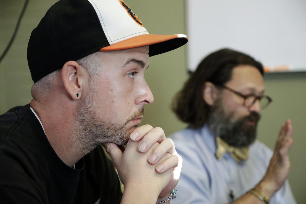 In this Oct. 8, 2018, photo, Tim Nolen, left, participates in a relapse prevention group session with counselor Bob Benson, right, at a treatment facility run by Buffalo Valley Inc. in Nashville, Tenn. 