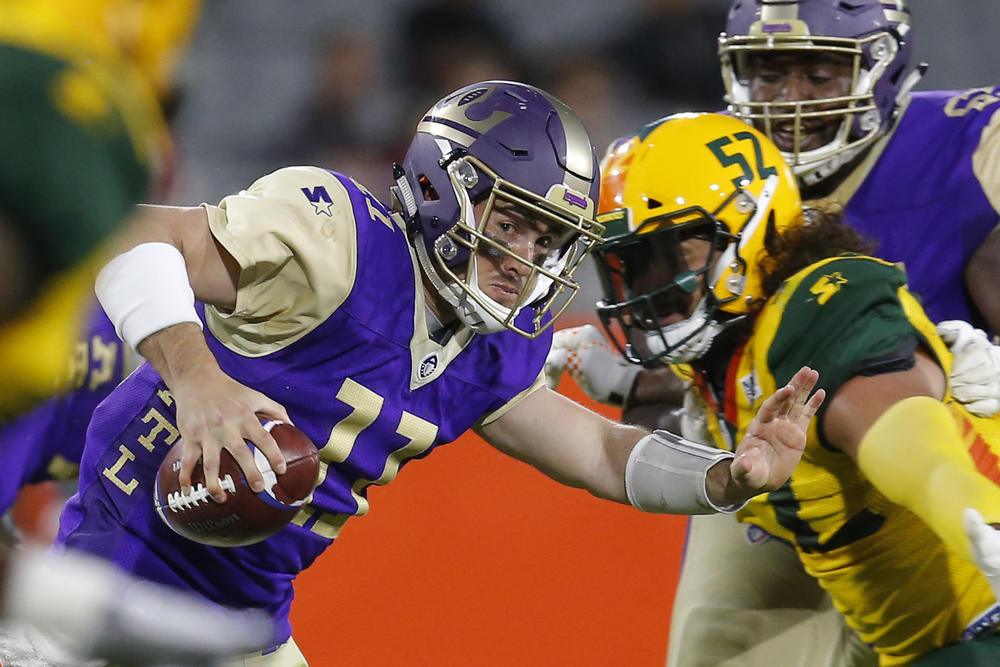 Atlanta Legends quarterback Aaron Murray (11) in the first half during an AAF football game against the Arizona Hotshots, Sunday, March 3, 2019, at Sun Devil Stadium in Phoenix. (AP Photo/Rick Scuteri)