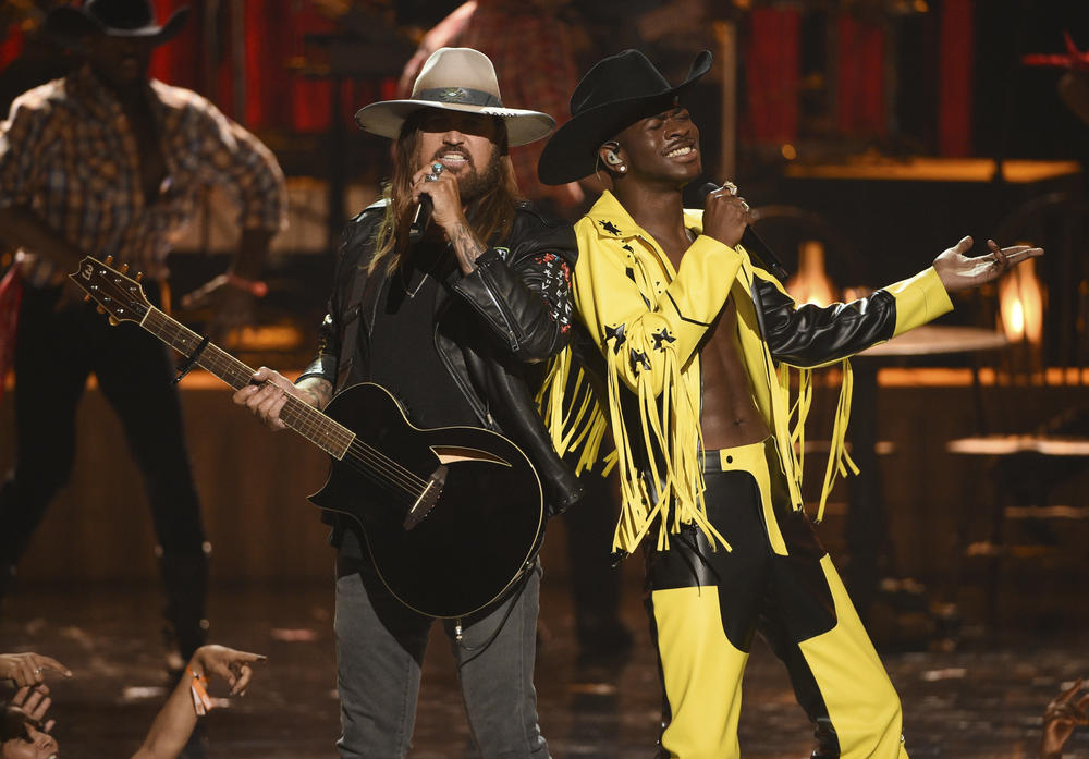 Billy Ray Cyrus, left, and Lil Nas X perform "Old Town Road" at the BET Awards on Sunday, June 23, 2019, at the Microsoft Theater in Los Angeles. 