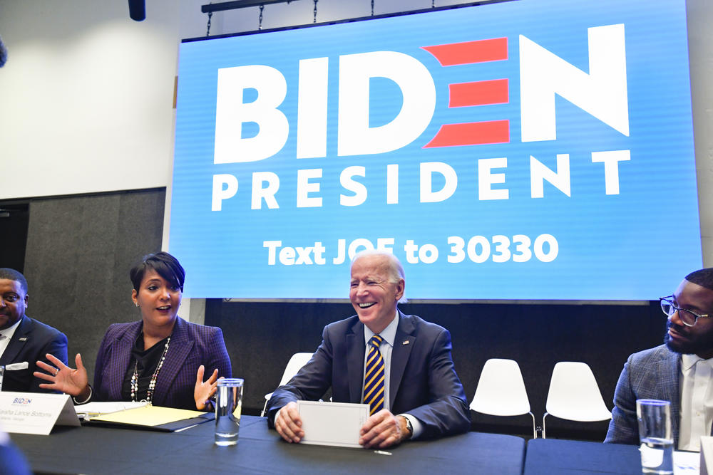 Former U.S. Vice President and 2020 Democratic presidential candidate Joe Biden reacts as he is introduced by Atlanta mayor Keisha Lance Bottoms during an assembly of Southern black mayors Thursday, Nov. 21, 2019 in Atlanta.