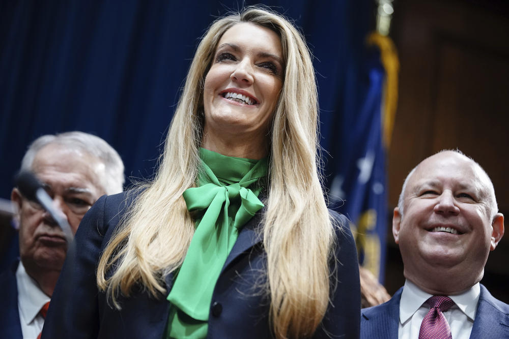 Businesswoman Kelly Loeffler smiles while being introduced by Georgia Gov. Brian Kemp as his pick to fill Georgia's vacant U.S. Senate seat at the Georgia State Capitol on Wednesday, Dec. 4, 2019, in Atlanta.