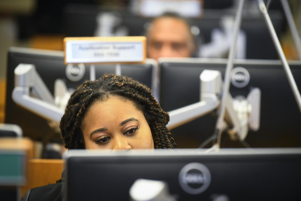 Personnel at the The Centers for Disease Control and Prevention (CDC) work the Emergency Operations Center in response to the 2019 Novel Coronavirus, among other things, Thursday, Feb. 13, 2020, in Atlanta.