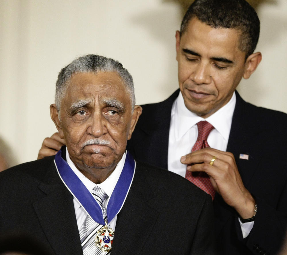  In this Aug. 12, 2009, file photo, President Barack Obama presents a 2009 Presidential Medal of Freedom to the Rev. Joseph E. Lowery n the East Room of the the White House in Washington.