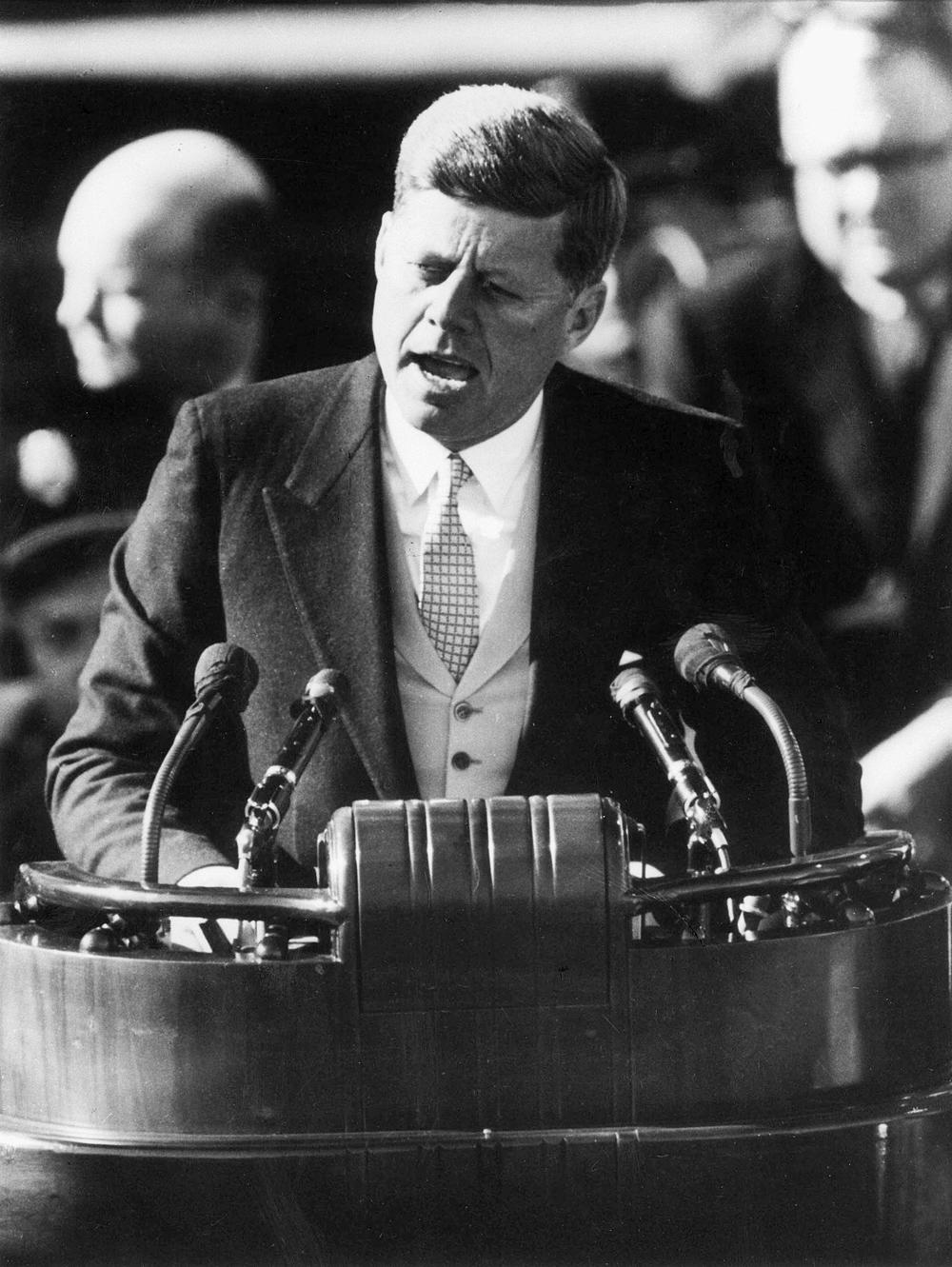 President John F. Kennedy delivers his inaugural address after taking the oath of office at the Capitol in Washington Jan. 20, 1961. 