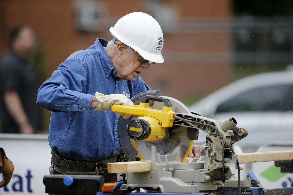 Former President Jimmy Carter works at a Habitat for Humanity building site Monday, Nov. 2, 2015, in Memphis, Tenn. Carter and his wife, Rosalynn, have volunteered a week of their time annually to Habitat for Humanity since 1984.