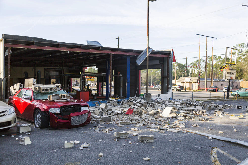 One whole wall of an Albany mechanics shop  destroyed by the storms of January, 2, 2017. 