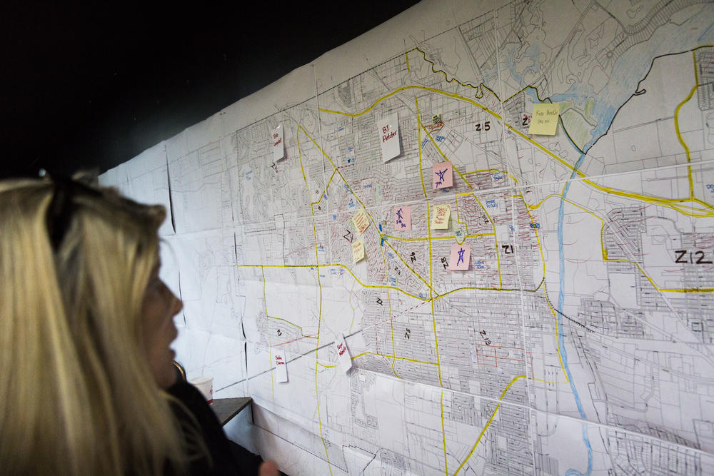 Marla Edmonds with the map she uses to organize volunteer storm relief efforts around Albany and Dougherty County. Edmonds' related Facebook group has 5,000 members either offering help or asking for it. 