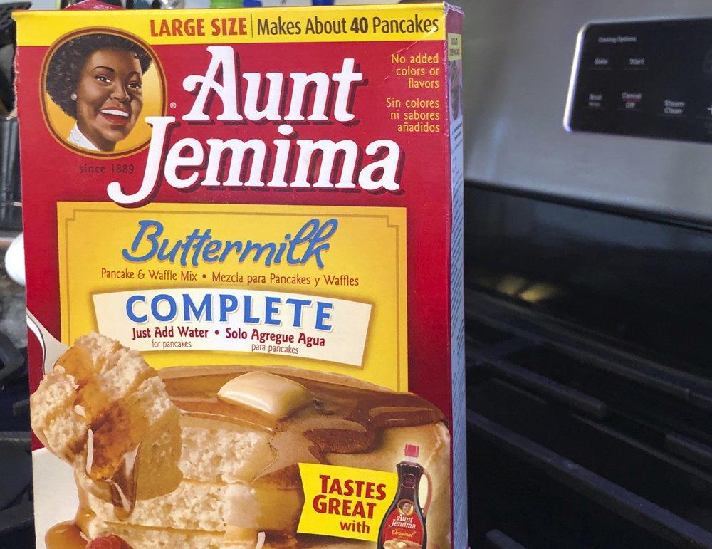 A box of Aunt Jemima pancake mix sits on a stovetop Wednesday, June 17, 2020, in Harrison, N.Y. Pepsico is changing the name and marketing image of its Aunt Jemima pancake mix and syrup, according to media reports. 