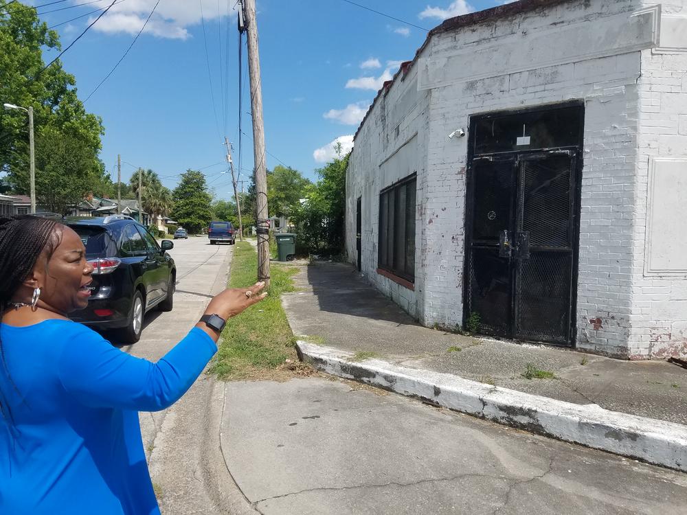 Marsha Buford points out the former site of a neighborhood grocery in West Savannah. Today, the closest grocery stores are more than two and a half miles away.
