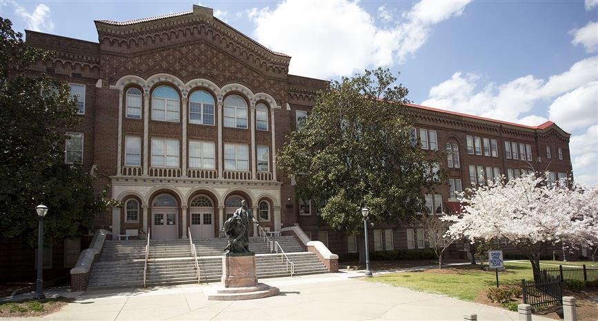 Rivers-Cannon works with students at Booker T. Washington High School (above) and Fickett Elementary School in Atlanta.