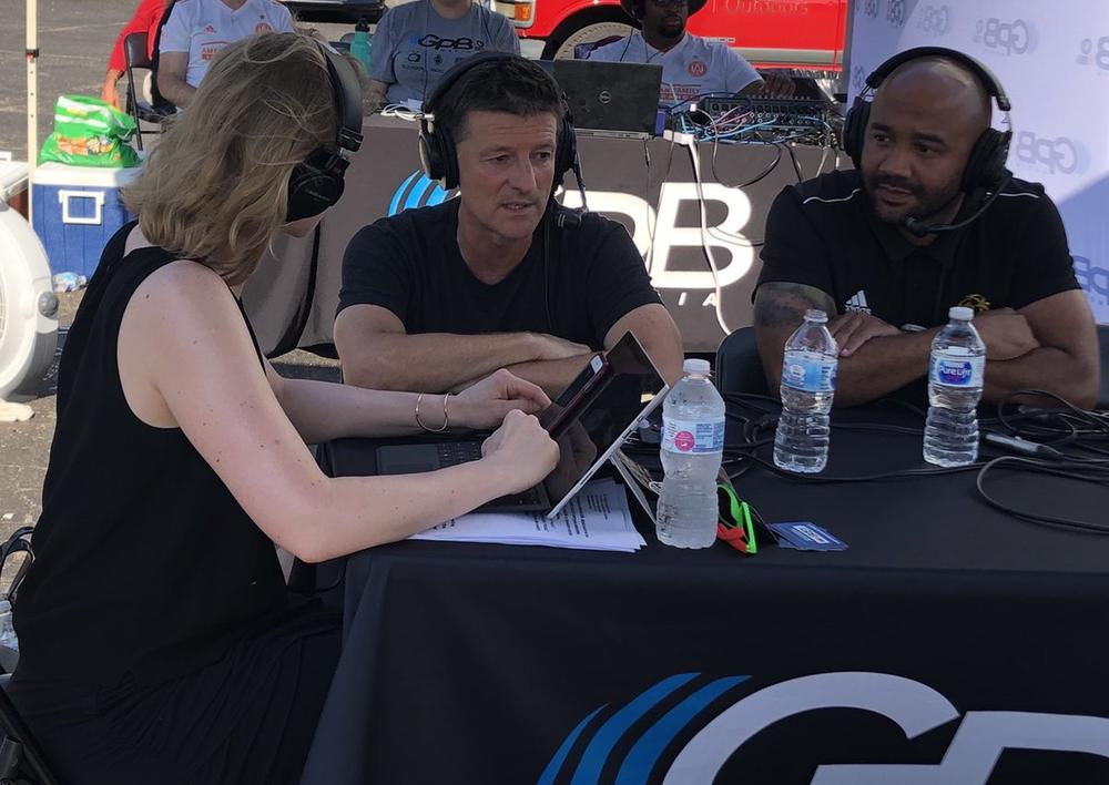 GPB's Rickey Bevington speaks with Phil Hill (center) and Tony Carter (right) about Soccer in the Streets.