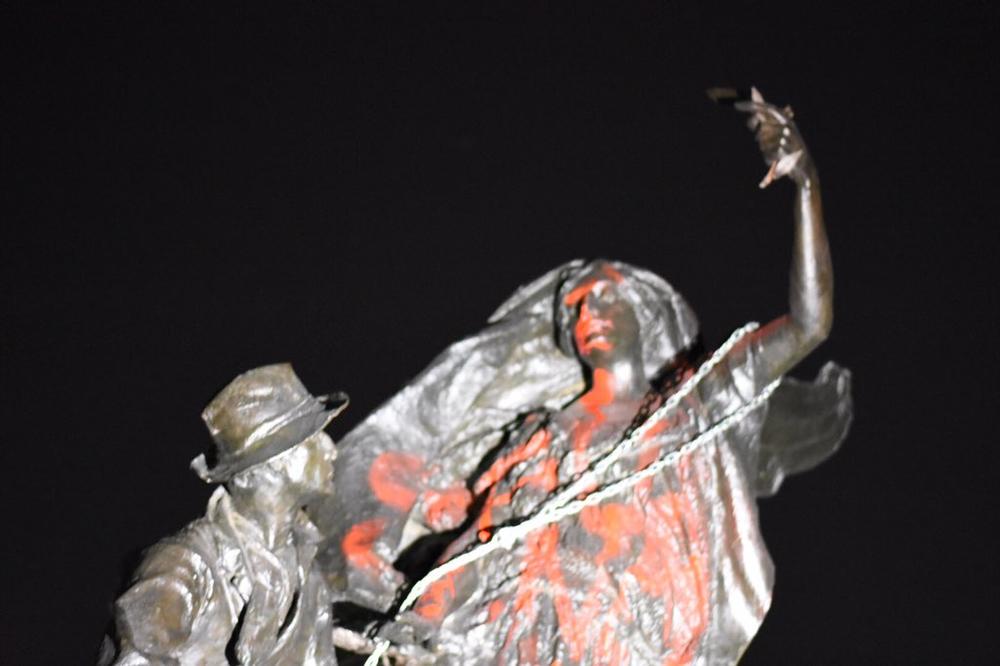 Some of the protesters defaced the Peace Monument statue in Piedmont Park, erected in 1911 to symbolize the reconcillation of North and South after the Civil War.