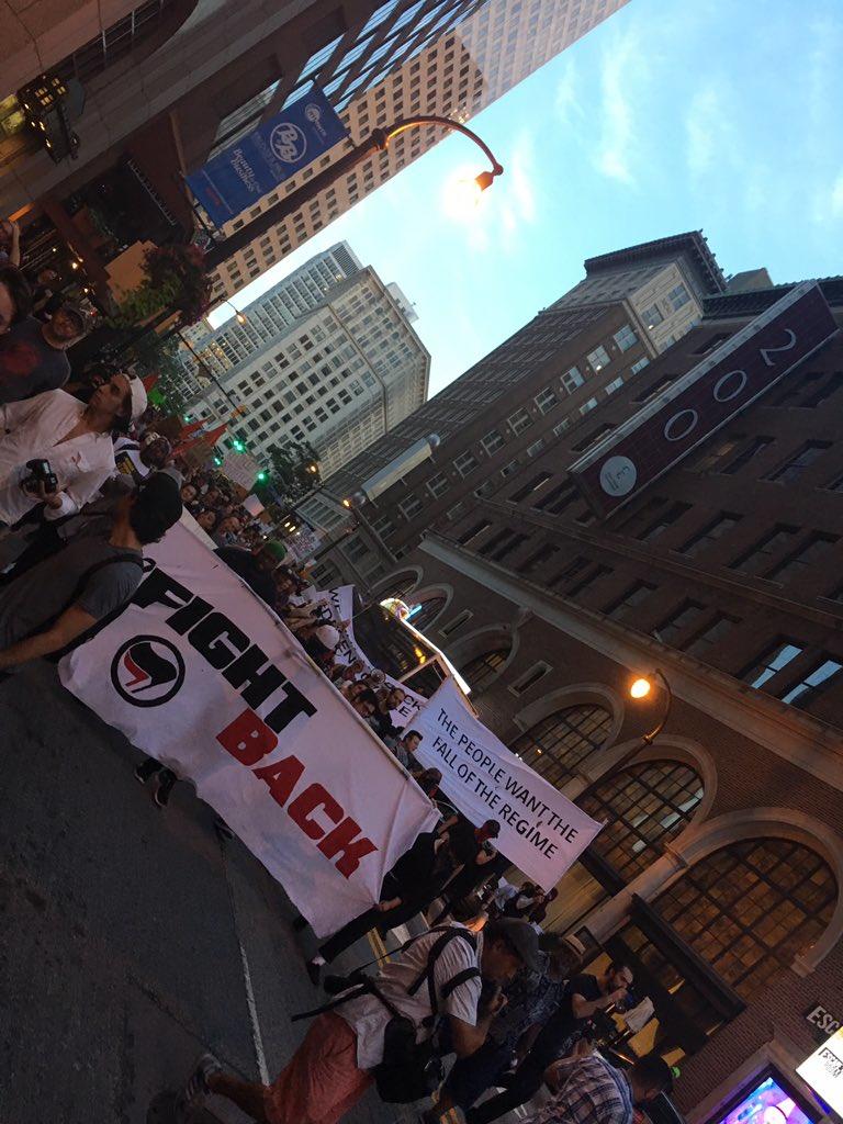 Demonstrators walk through Downtown Atlanta, on their way to Piedmont Park.