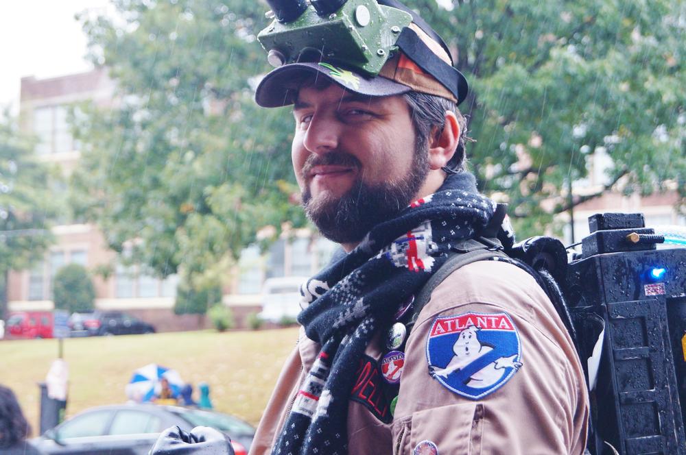 A man in a Ghostbusters costume posed for a picture.