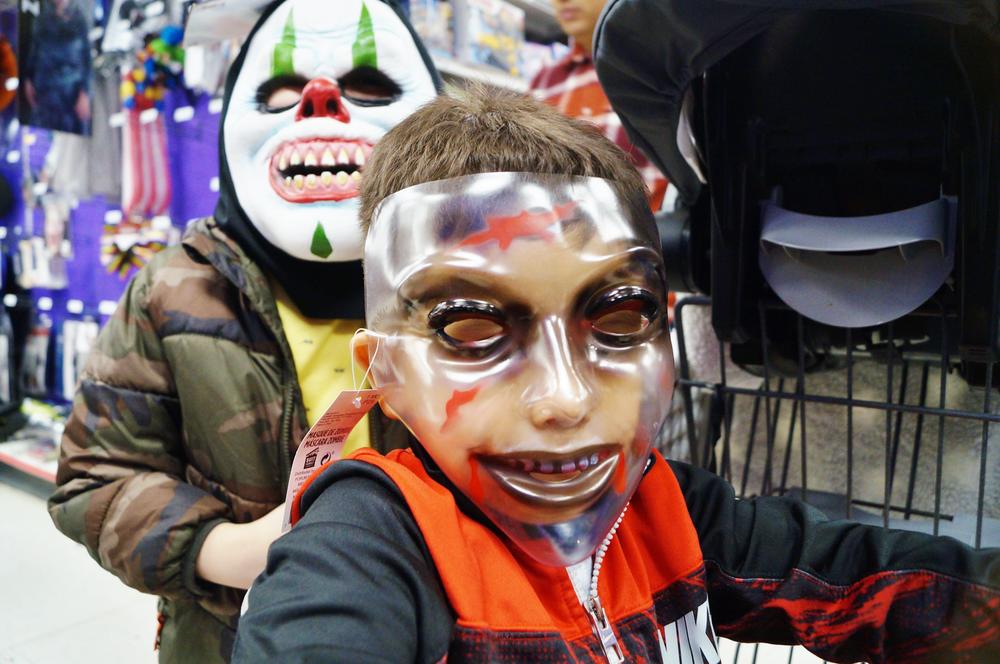 Two boys wore masks in Party City.