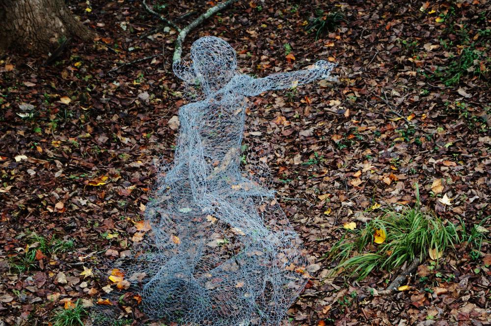 A ghostly figure sat in the Fernbank Forest.