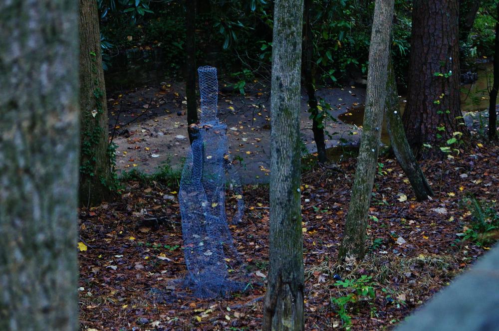 A ghostly figure nestled in the Fernbank Forest.