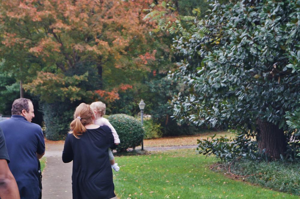 A family walked through an Atlanta neighborhood.