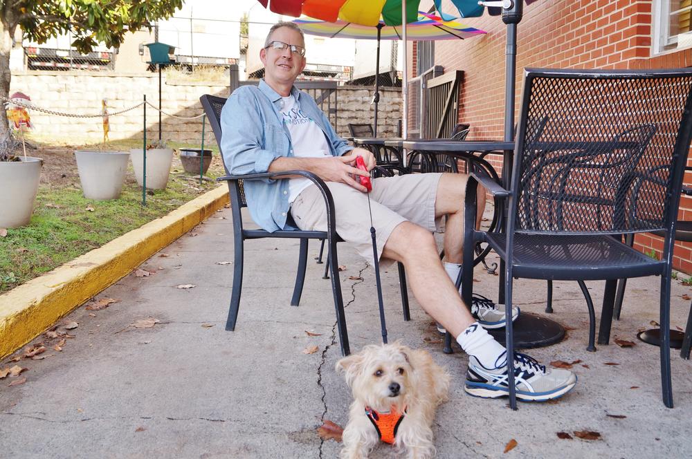 Tom Wiley is thankful for Georgia's sunny weather. His dog, Oliver, is thankful for a walk.
