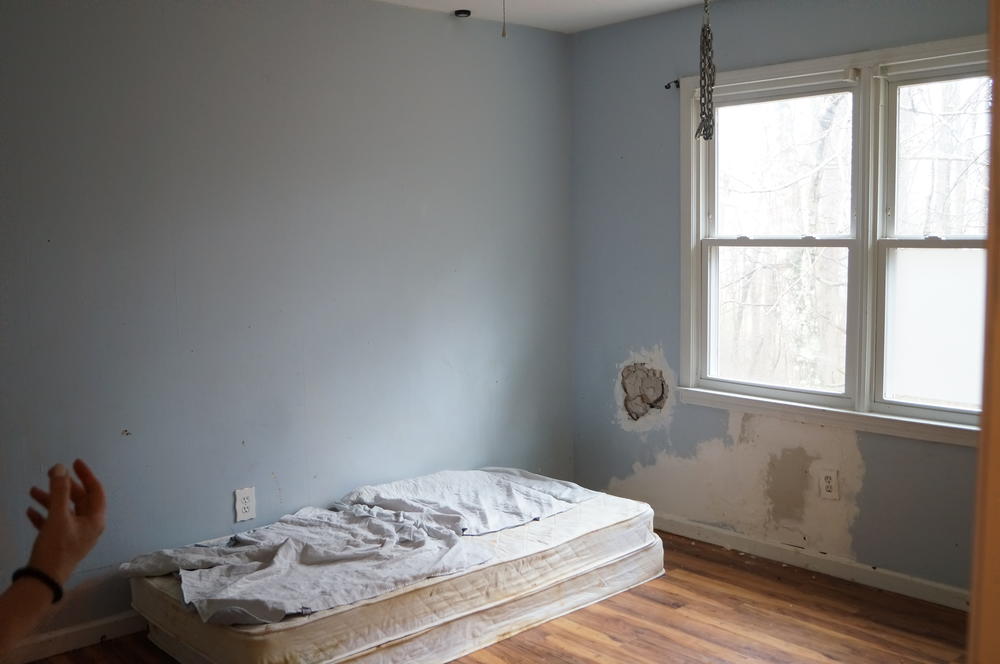Toys, drawers and bookshelves used to be in Johnathan's room, but his room had to be stripped bare because of his physically destructive behaviors.