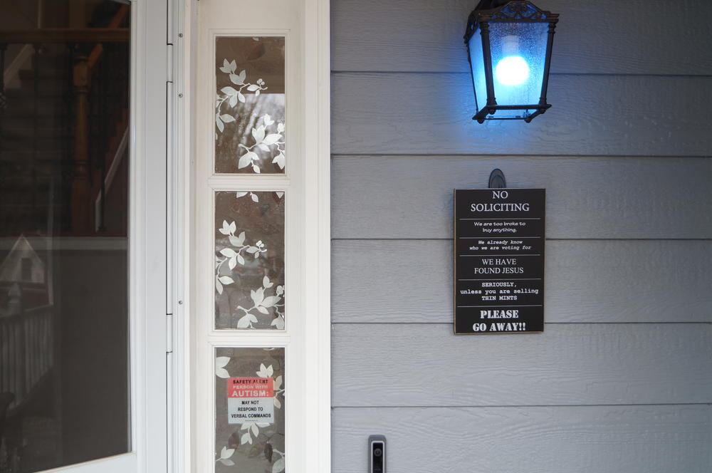 A blue light in recognition of autism awareness lights up the Sherwood family's porch.