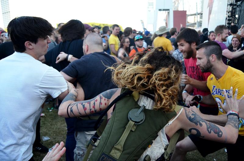 Fans in a mosh pit at Deftones show