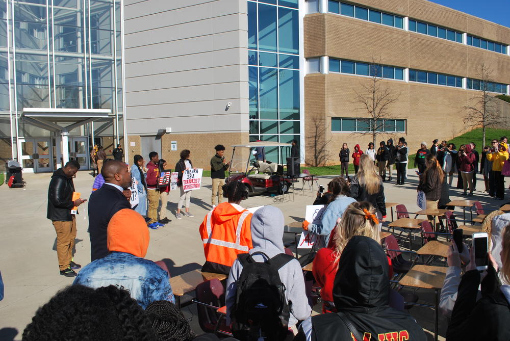 Students give speeches demanding action on gun laws with the administration's blessing at Maynard Jackson High School in East Atlanta.