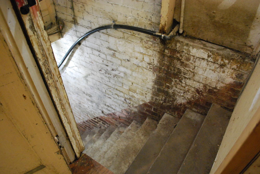 Basement stairs lead to the original ground level in Rome, Georgia. 