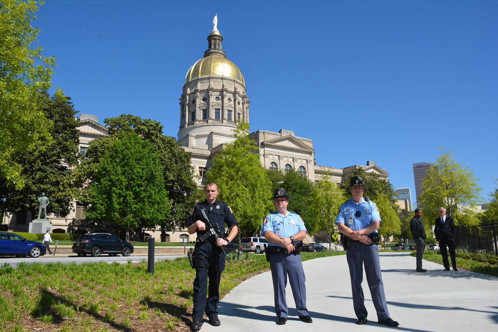 Members of the Georgia State Patrol gather to keep an eye on the rally.