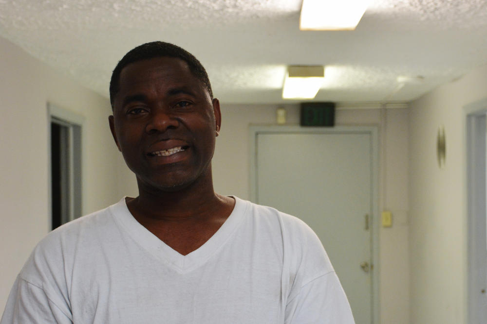 Tony Torrence takes a break from a meeting of the Vine City Civic Association to chat.