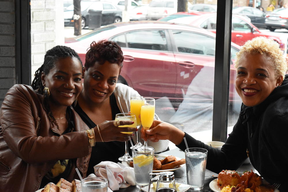 Lindsay Grubbs is celebrating her birthday with her sisters while brunching at 10th and Piedmont. 