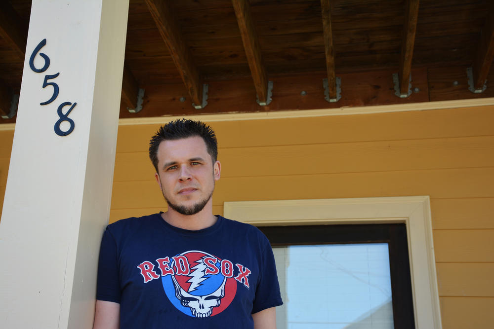 James Doyle on the porch of his Vine City home.